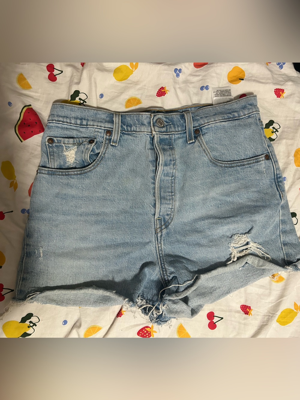 Levi’s Light Blue Distressed High-Rise Denim Shorts